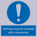 vehicles-must-be-reversed-with-a-banksman~